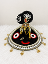 Black Laddu Gopal poshak with pearl detailing, red and white accents, and gold embellishments